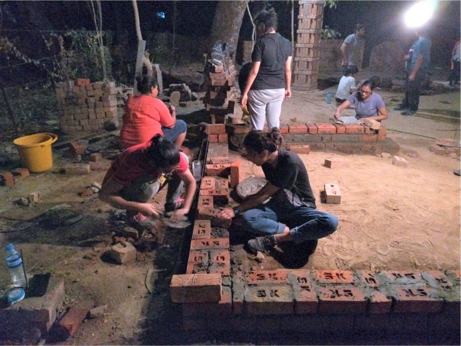 The footing laid after dark; the pour would not wait for morning.